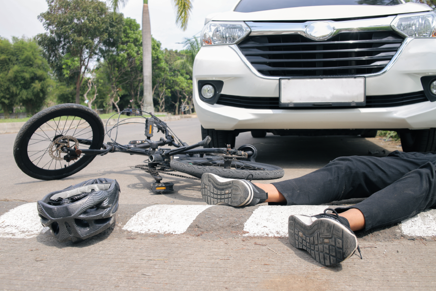 Tragic Bicycle Accident on Crosswalk Involving Car Requires Immediate Medical Attention