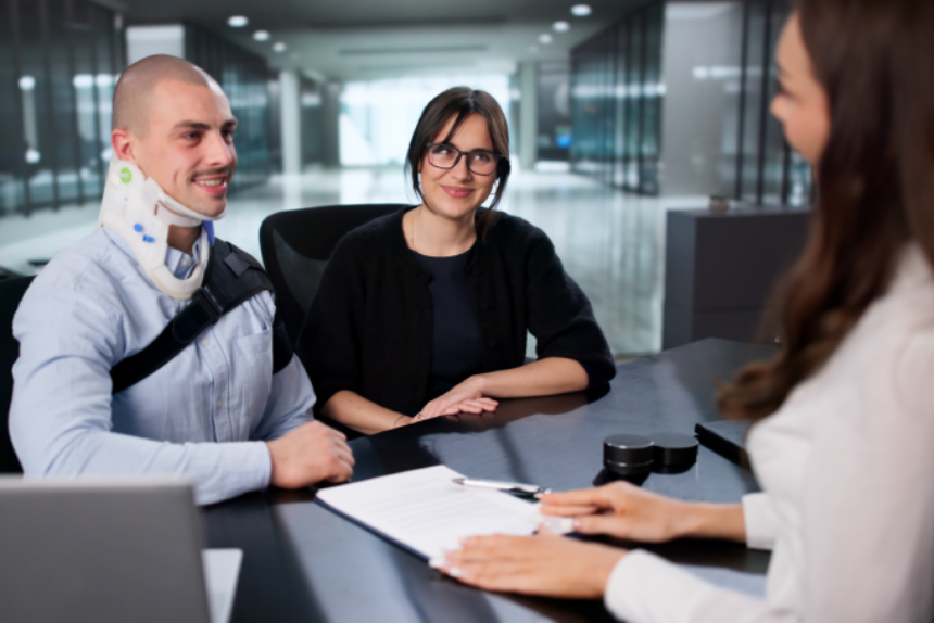 Injured Worker Smiles As Lawyer Settles Personal Injury Claim.