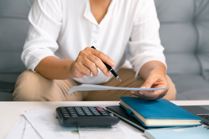 After inspecting finance documents and paperwork, he carefully calculated each tax deduction before filing, hoping for substantial refund on his income. interest, manager, pay, plan, preparation, irs