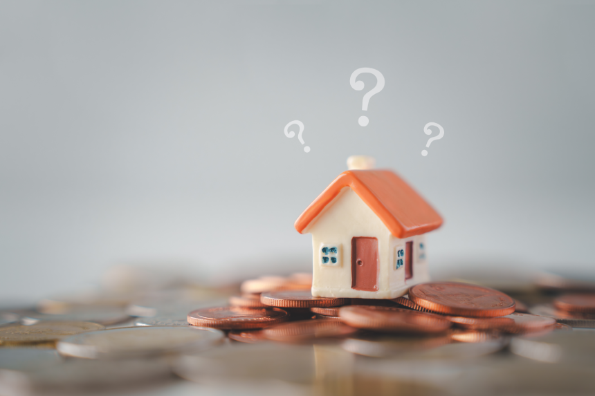 Question mark and house model on coins. Decision to choose the best property.