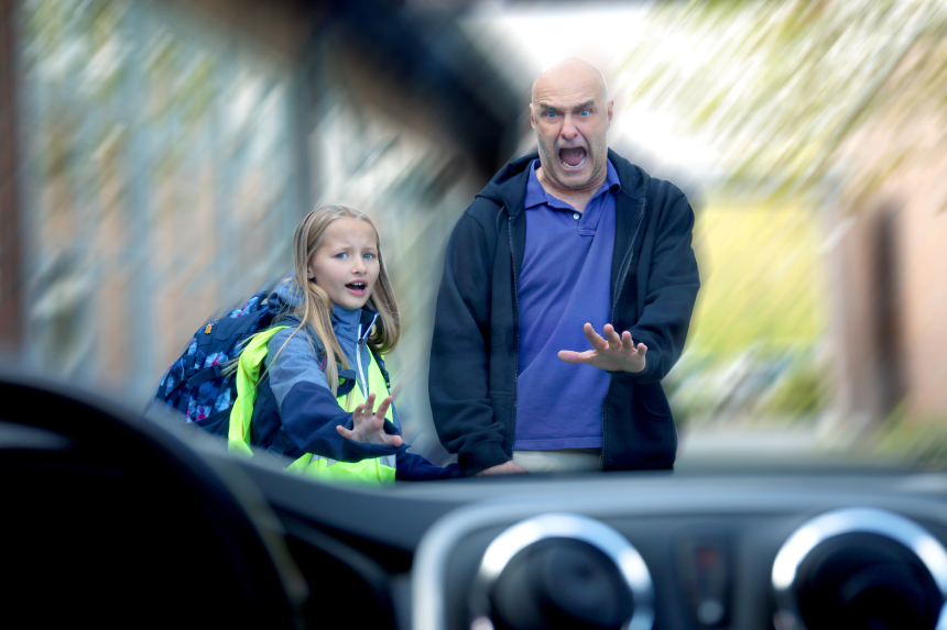 Man and child are hit by car while crossing a street