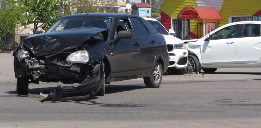 Double car crash accident on the city street.