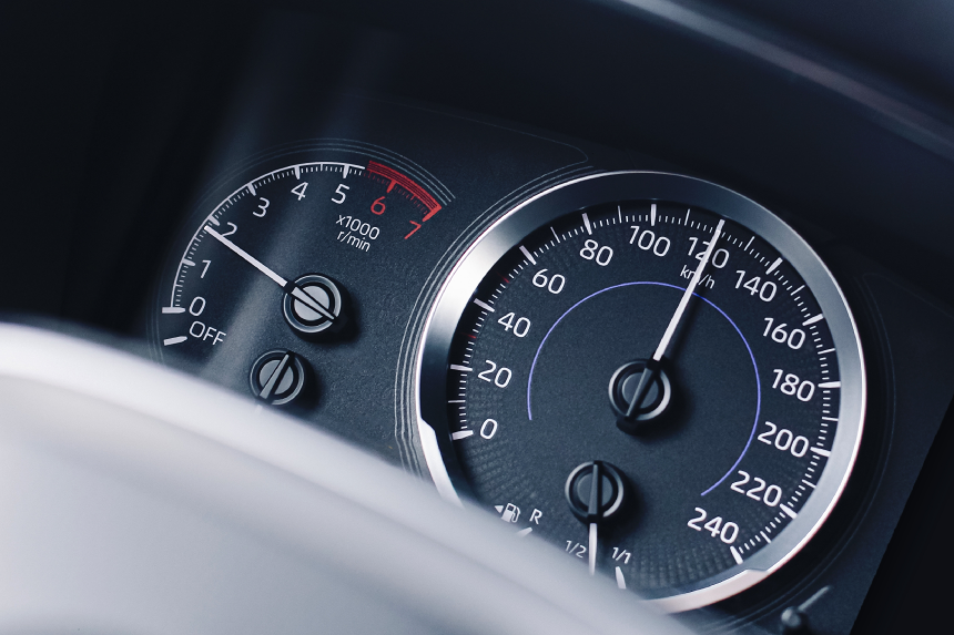 Car speed dashboard closeup. Speedometer and tachometer. Fast driving concept. Auto instrument panel.
