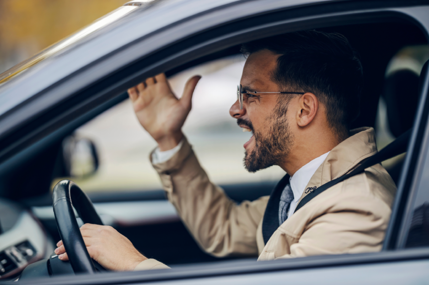 A mad elegant driver is caught in a road rage.