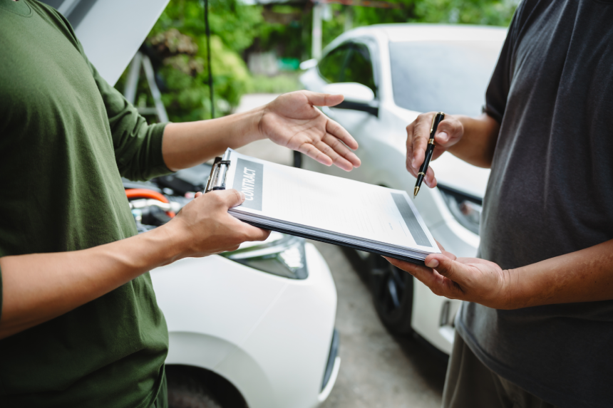 Three Asian men discussing car insurance policies with adjuster. They review details such as premiums, deductibles, coverage options while handling recent claim and evaluating the settlement process.